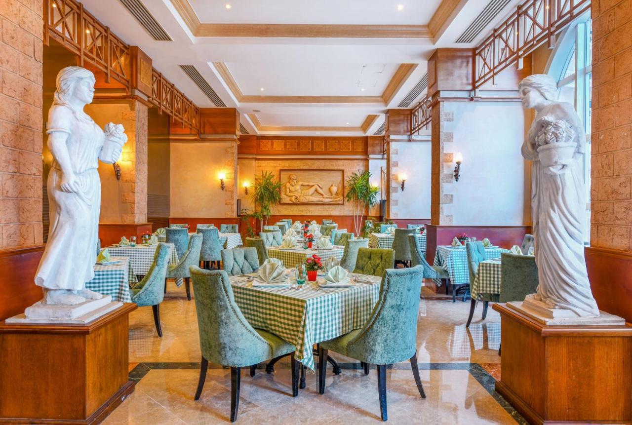 Tolip Hotel Alexandria Exterior foto The restaurant's interior