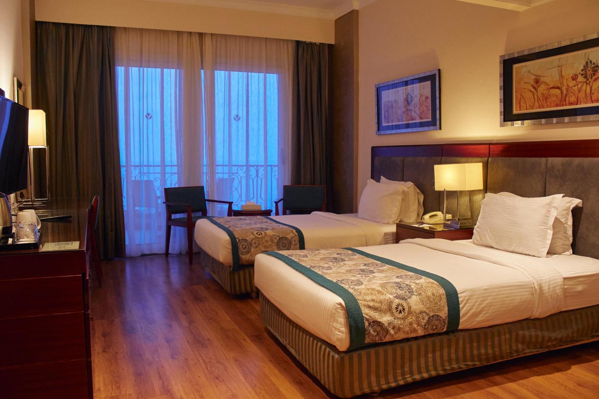 Tolip Hotel Alexandria Exterior foto A room at the hotel