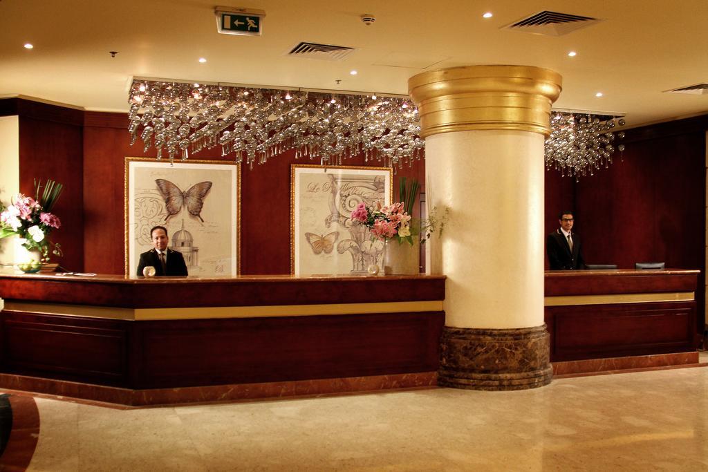 Tolip Hotel Alexandria Exterior foto Reception desk
