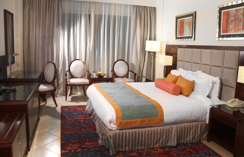 Tolip Hotel Alexandria Exterior foto A room at the hotel